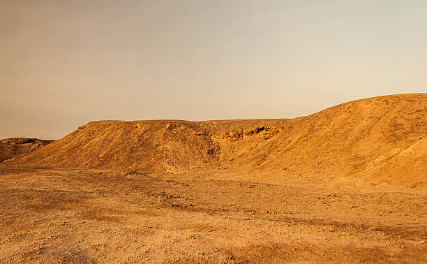 istock Sand dunes and rocks, Sahara Desert 178424590