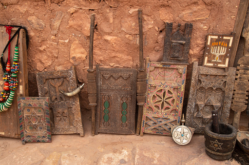 Old Moroccan carved interior wooden doors in street trade in Ait Ben Haddou, Morocco