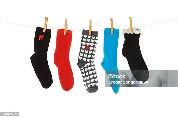 Odd Socks Stock Photo - Download Image Now - Sock, Hanging, In A Row