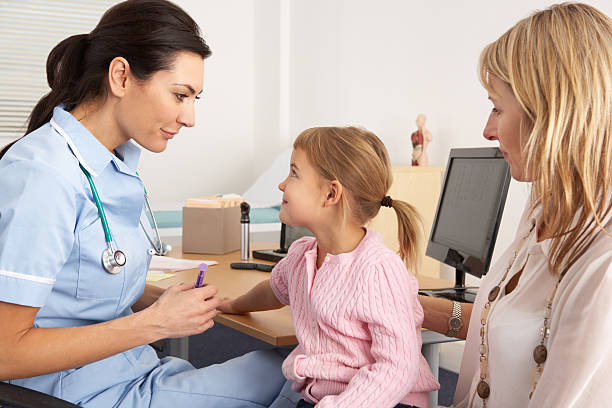 istock British nurse about to inject young child 178425050