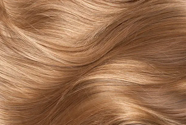 Wavy blonde human hair background