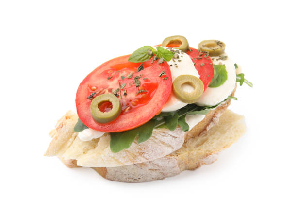 istock Tasty bruschetta with tomatoes, mozzarella and olives on white background 1784256508