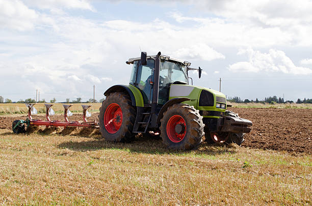 istock tractor plowing agricultural field autumn 178425746