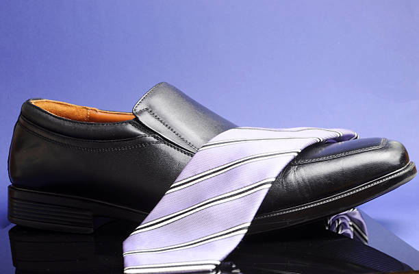 Luxury men's clothing accessories. Purple collection, jacket, cufflinks, tie and handkerchief. Father's Day and Valentine's Day concept.