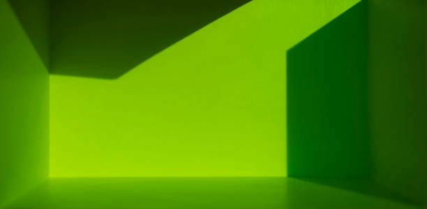 istock Refraction of light and bright green shadows in an empty room 1784264898