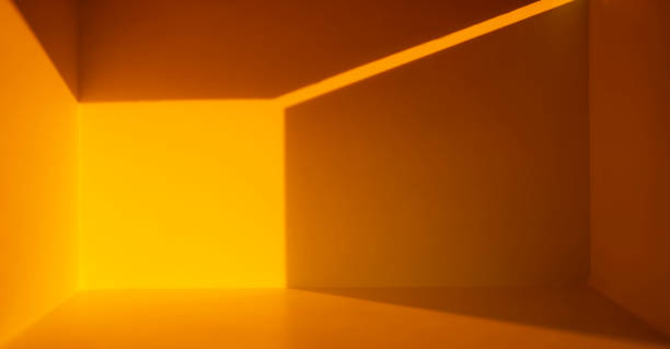 istock The light and shadow in the empty bright yellow room 1784265423
