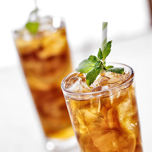 istock two ice cold glasses of iced tea with mint 178426921