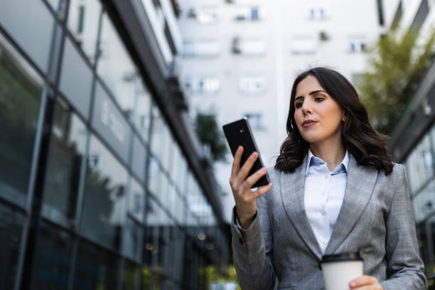istock Businesswoman's Coffee and Mobile Ritual 1784273308