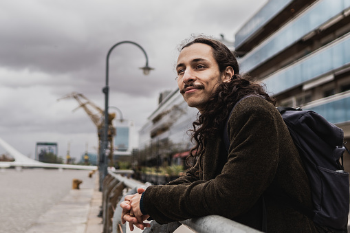 Young man contemplating in Puerto Madero, Buenos Aires