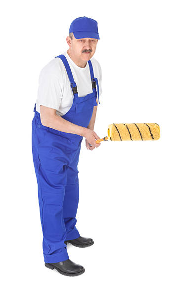 istock house painter is painting invisible wall over white 178428761