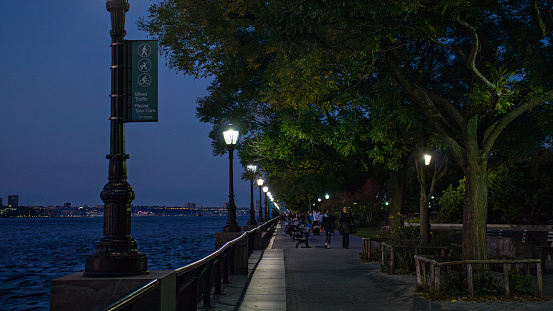 Battery City Park walkway at night