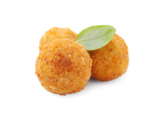 istock Delicious fried tofu balls and basil on white background 1784288721