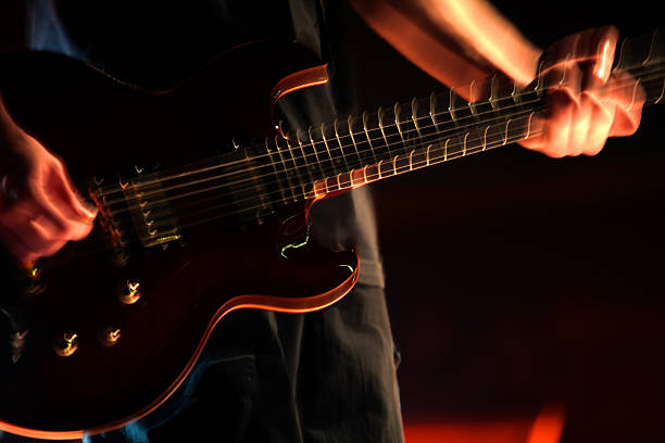 istock Guitarist at nightclub, blur in moving 178429301