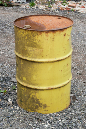 A Yellow Barrel presumably used for oil storage.