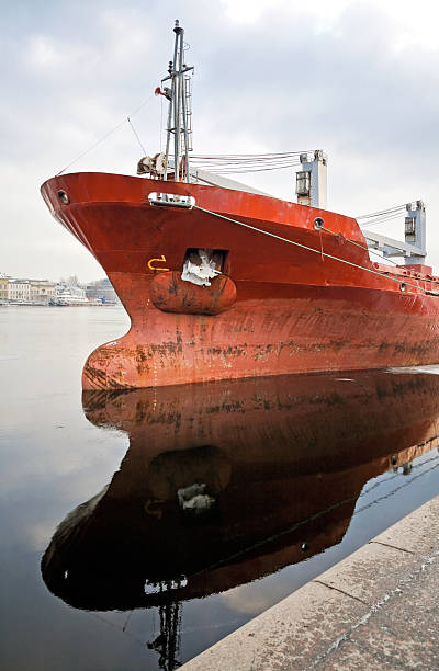 istock Bulbous bow design detail on moored trader ship 178429415