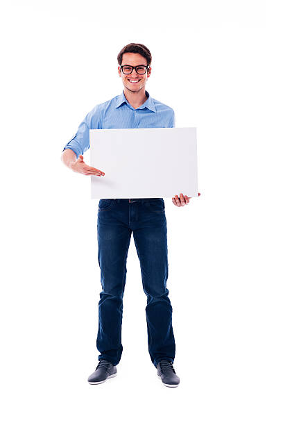 istock Man wearing glasses holding white board 178429702