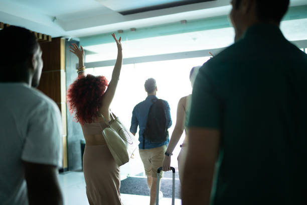 istock Traveler friends walking at hotel lobby 1784301595