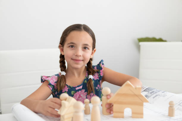 istock Girl playing and dreaming about her new house 1784302117