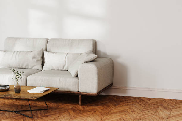 istock living room interior mock up, white wall with sunlight, gray sofa and coffee table with decor, 3d rendering 1784312165