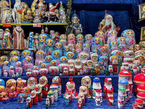 Cologne, Germany, 12/04/2022: Cute matryoshka dolls in a Christmas shop window.