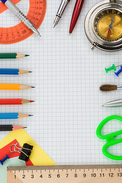 istock school supplies on  checked paper 178432828