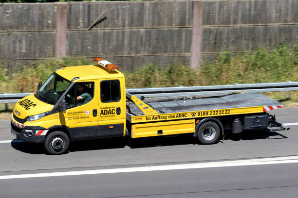 Wiehl, Germany - July 7, 2018: ADAC flatbed recovery vehicle on motorway
