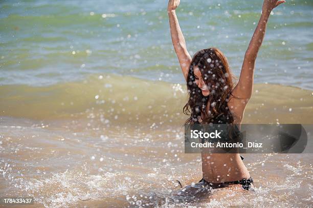 Making A Big Splash Of Fun Stock Photo - Download Image Now - Adult, Adults Only, Arms Raised