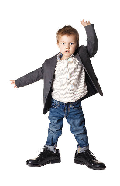 istock little boy in the big dance shoes 178433608