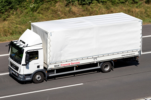 Wiehl, Germany - July 14, 2018: MAN Financial Service truck on motorway