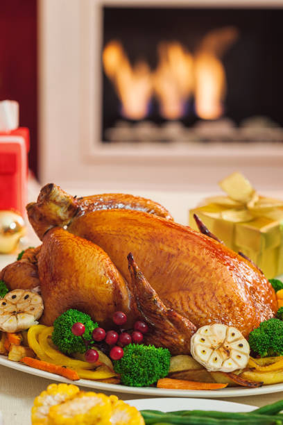 istock Stuffed turkey at a traditional Christmas dinner 1784338599