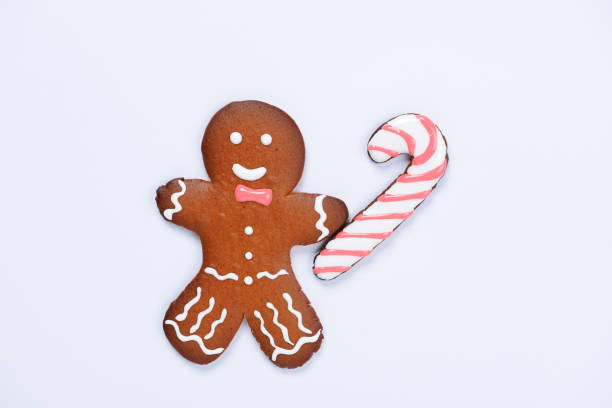 istock The hand-made eatable gingerbread little man with caramel on white background 1784341818