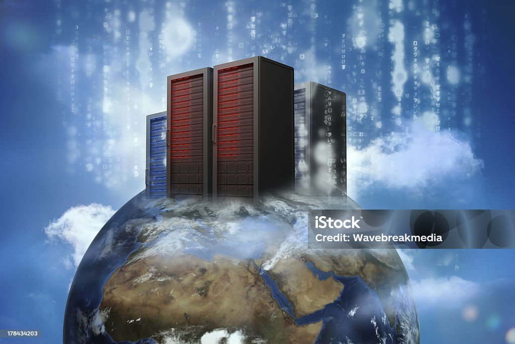 Data servers on top of the world Data servers on top of the world with falling matrix in the sky Blue Stock Photo