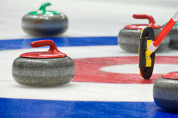 Pedra de Curling - fotografia de stock