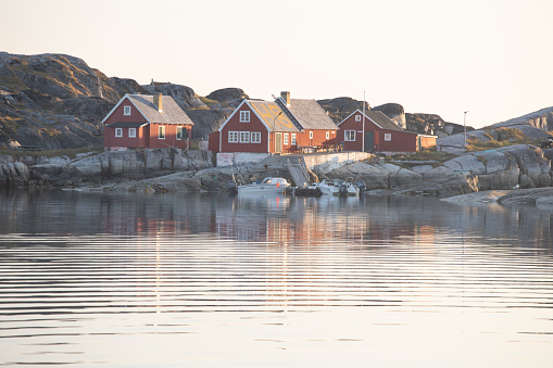 Panoramic view of Disko Bay with icebergs from the village Oqaatsut in the early morning near Ilulissat. The source of these icebergs is the Jakobshavn glacier, West Greenland