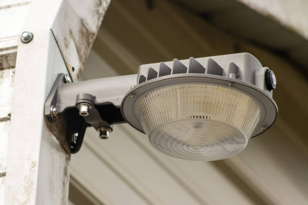 istock LED Light mounted to exterior building wall 1784353239
