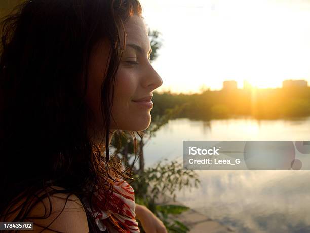 Girl Meditating Over Sunset Stock Photo - Download Image Now - Adult, Adults Only, Buddhism