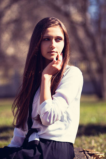 istock Beautiful girl sitting 178435710