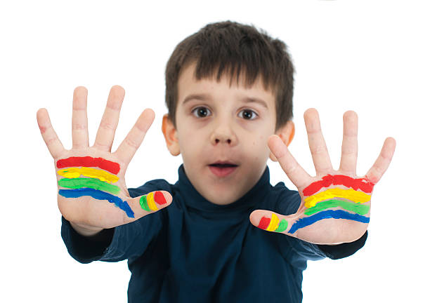 istock Boy hands painted with colorful paint 178435955