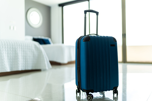 Close-up of a suitcase at hotel room