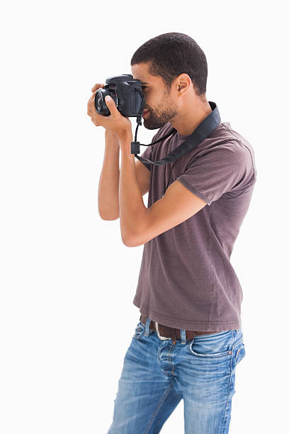 istock Stylish man taking photograph with digital camera 178436768