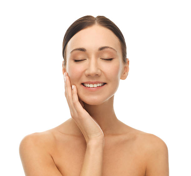 istock beautiful woman touching her skin 178437826