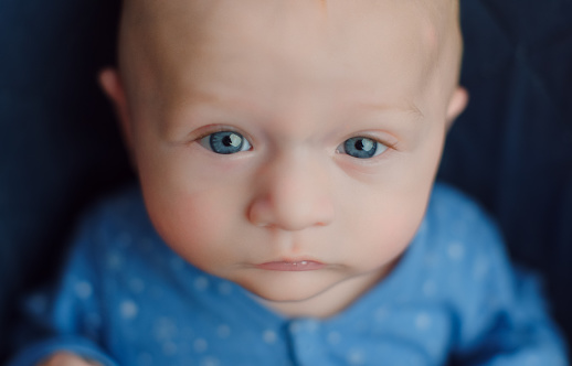 Portrait of baby with blue eyes