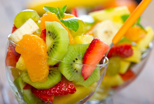 Closeup of two glasses with mixed fruit salad