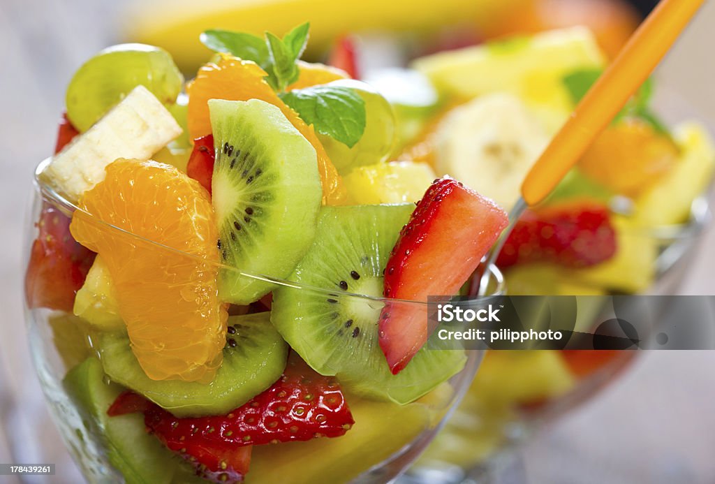 Mixed fruit salad Closeup of two glasses with mixed fruit salad Fruit Stock Photo