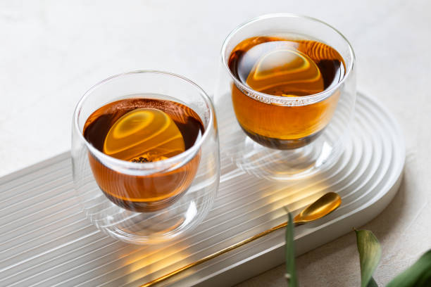 istock Pair cups of tea on white tray. Design style. 1784398466