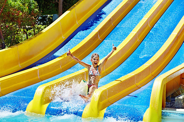 istock Children on water slide at aquapark. 178440944
