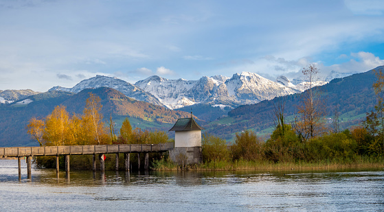 Stunning fall alpine scenery along the shores of the upper Zurich Lake (Obersee), Rapperswil, St. Gallen, Switzerland