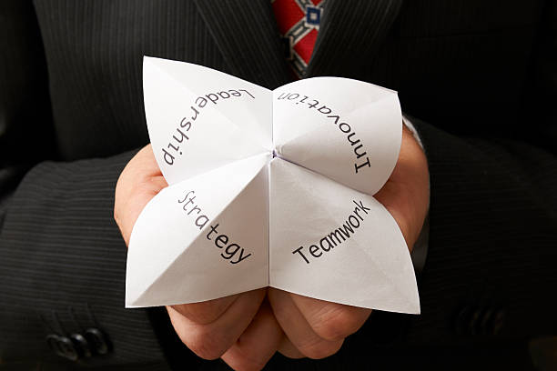 istock businessman and origami 178441830