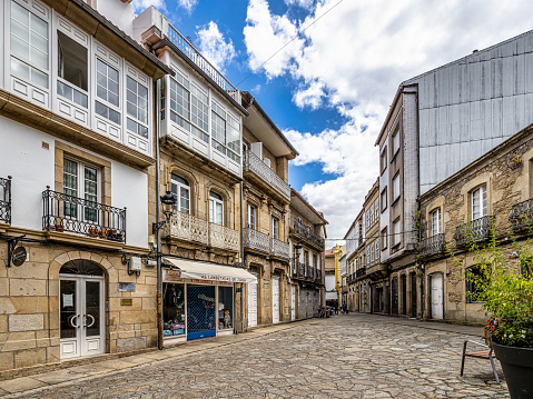 Noia, Spain - Jun 27, 2023: General view of the Tapal square and adjoining buildings, in the urban center of the city of Noia in Galicia, Spain