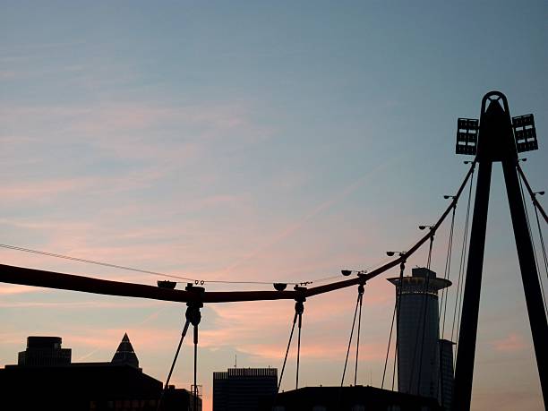 istock Bridge over Main river at dusk, Frankfurt Germany 178442289